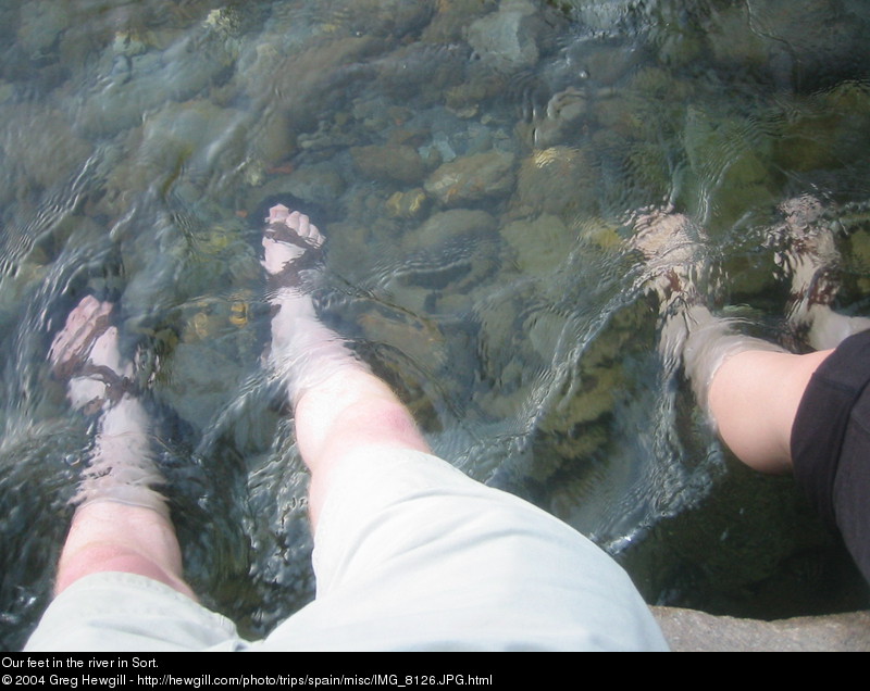 Our feet in the river in Sort.