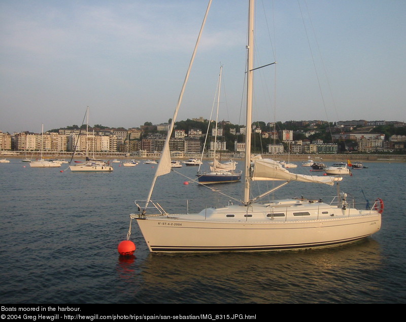 Boats moored in the harbour.