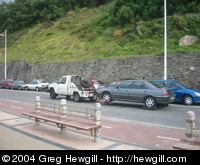 While I was sitting on the seafront I heard a clattering of tiny wheels on the stone roadway behind me. They are serious about their parking here.